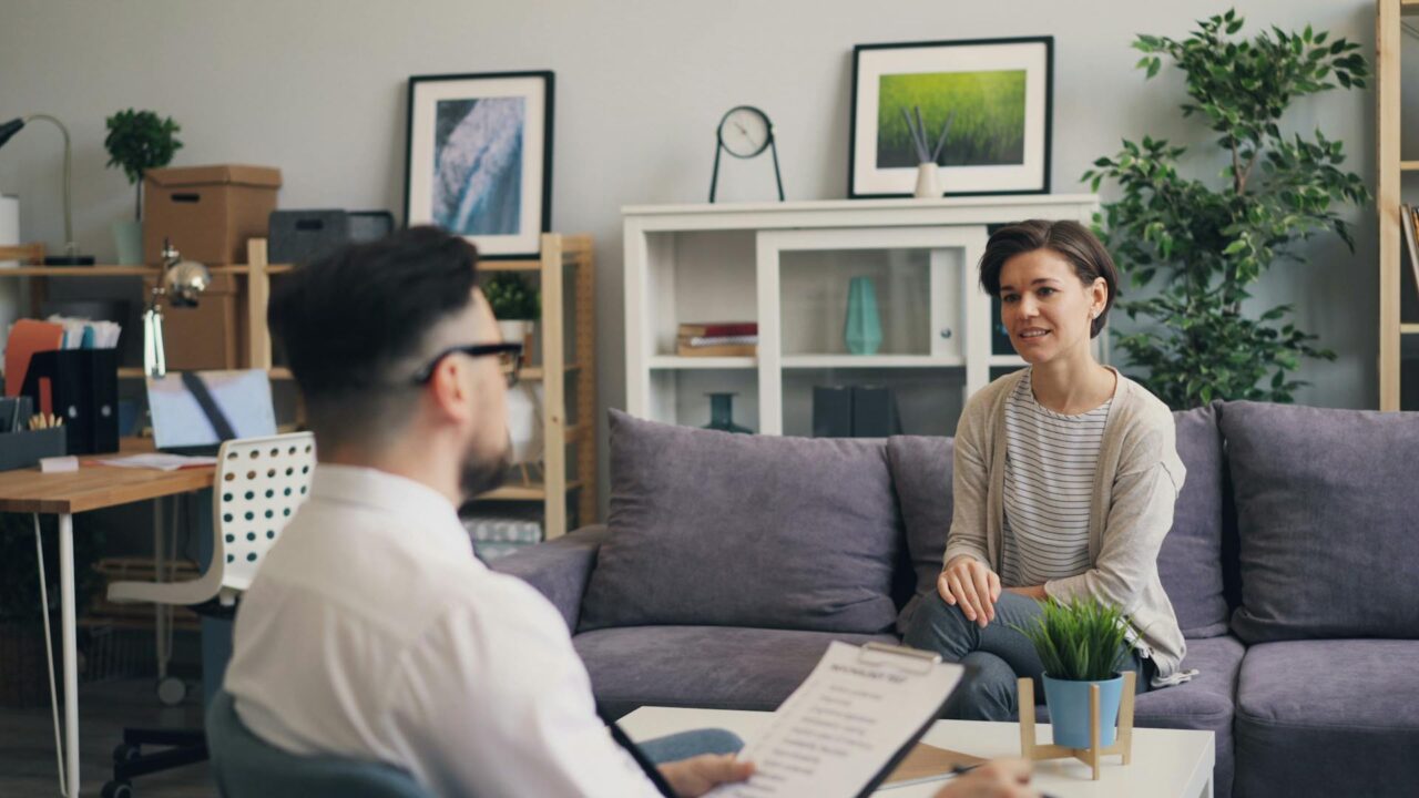 Two people discussing terms of contract